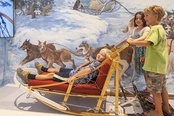 Kids Playing on Dog Sled Interactive